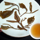 2004 Shi Kun Mu Yibang Gushu Raw Puerh Cake 400g